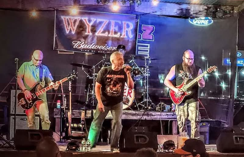 Wyzer performing classic rock live at Pinballz Kingdom in Buda, Texas